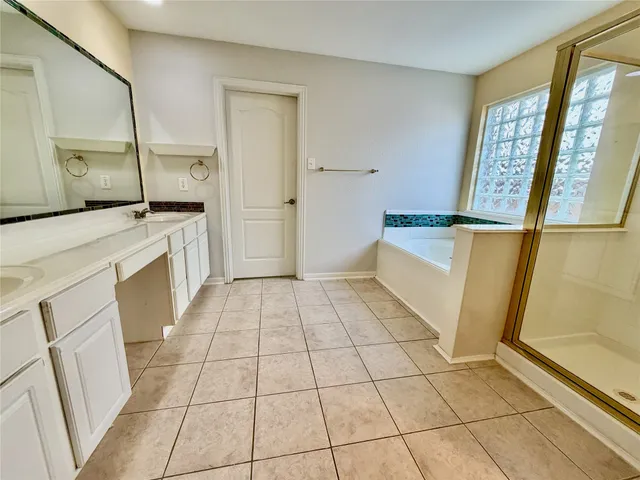 a kitchen with stainless steel appliances a stove a sink and a microwave