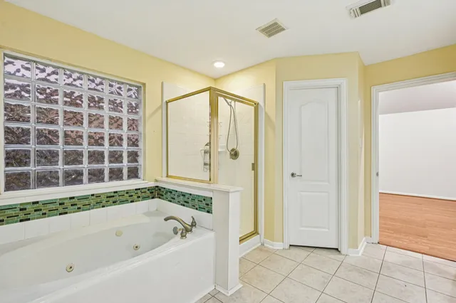 a kitchen with stainless steel appliances granite countertop a stove top oven sink and cabinets