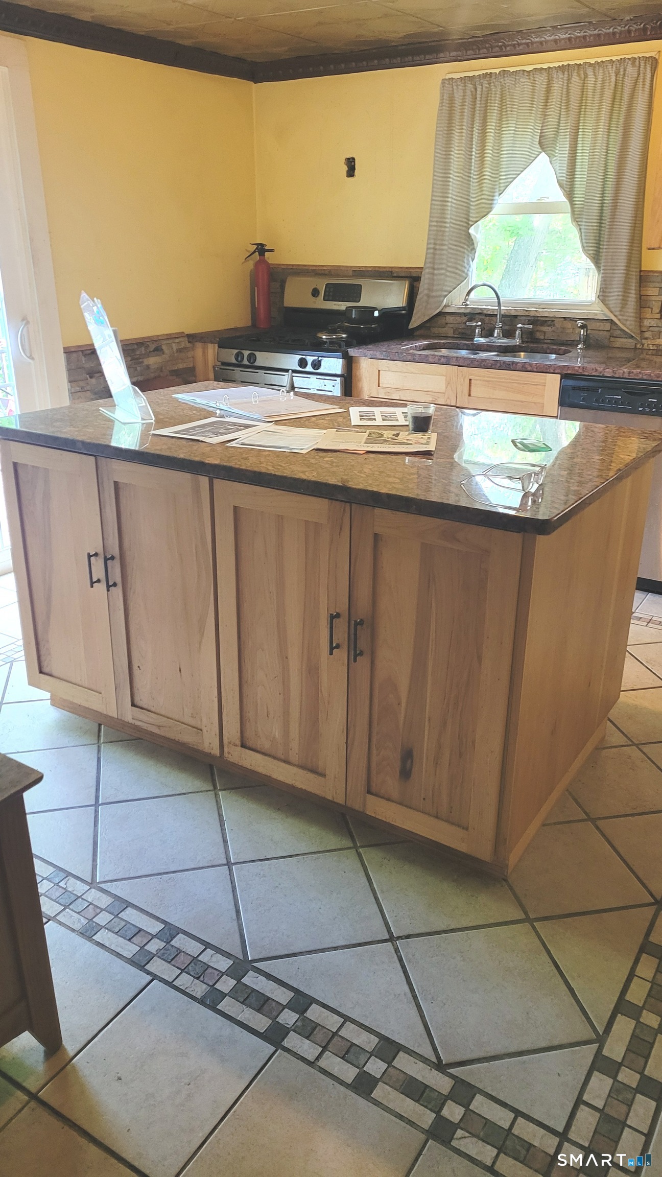 22 Ridgewood Road East Haddam, CT 06415 - Photo 4 of 28 The center island which is granite topped and features lots of cabinets and drawers