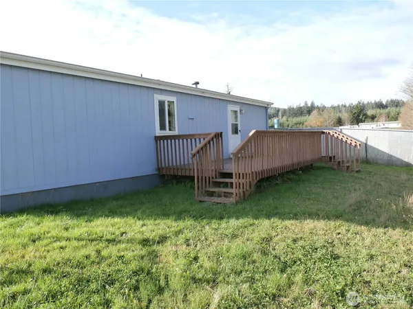a view of a backyard with a garden