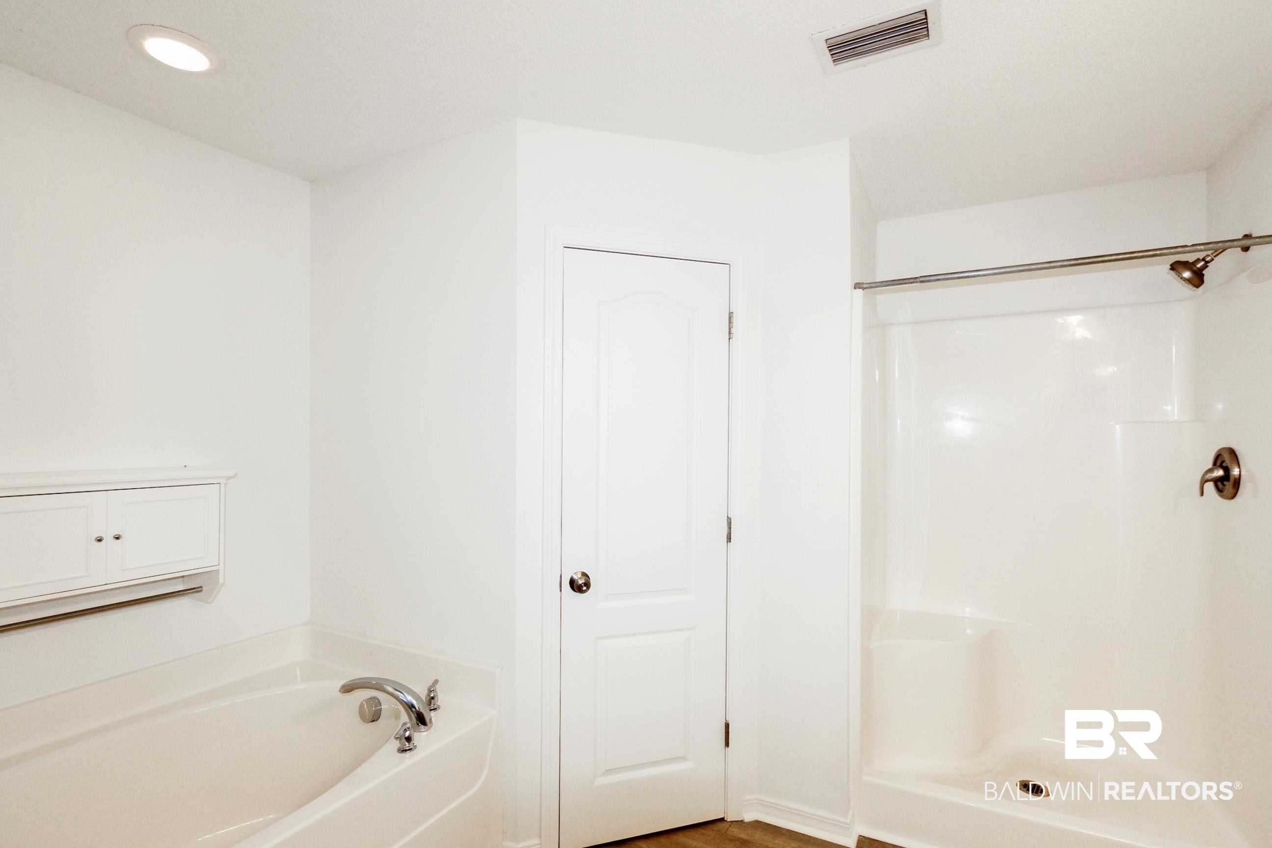 14750 Pawnee Court Foley, AL 36535 - Photo 24 of 34 Bathroom with a garden tub, a shower, and recessed lighting