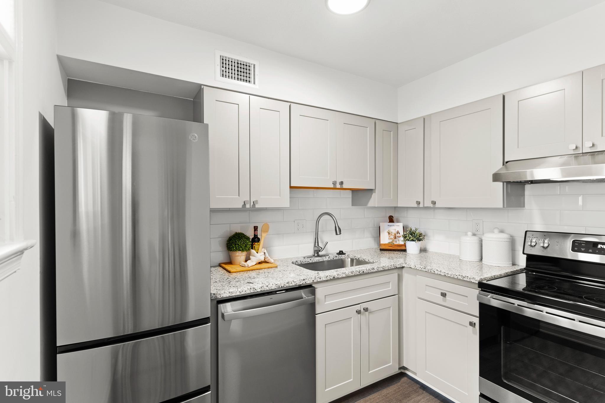 1910 T Street Northwest, Unit 2 Washington, DC 20009 - Photo 12 of 39 Totally renovated kitchen.