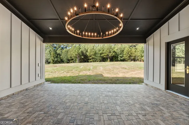a bathroom with a toilet and shower