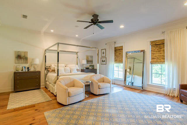 32576 Whimbret Way Daphne, AL 36527 - Photo 19 of 25 Master Bedroom is 21' x 19' and Reclaimed Pine Flooring Continues
