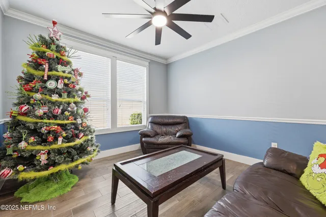 a kitchen with stainless steel appliances granite countertop a refrigerator a sink dishwasher a stove and a refrigerator