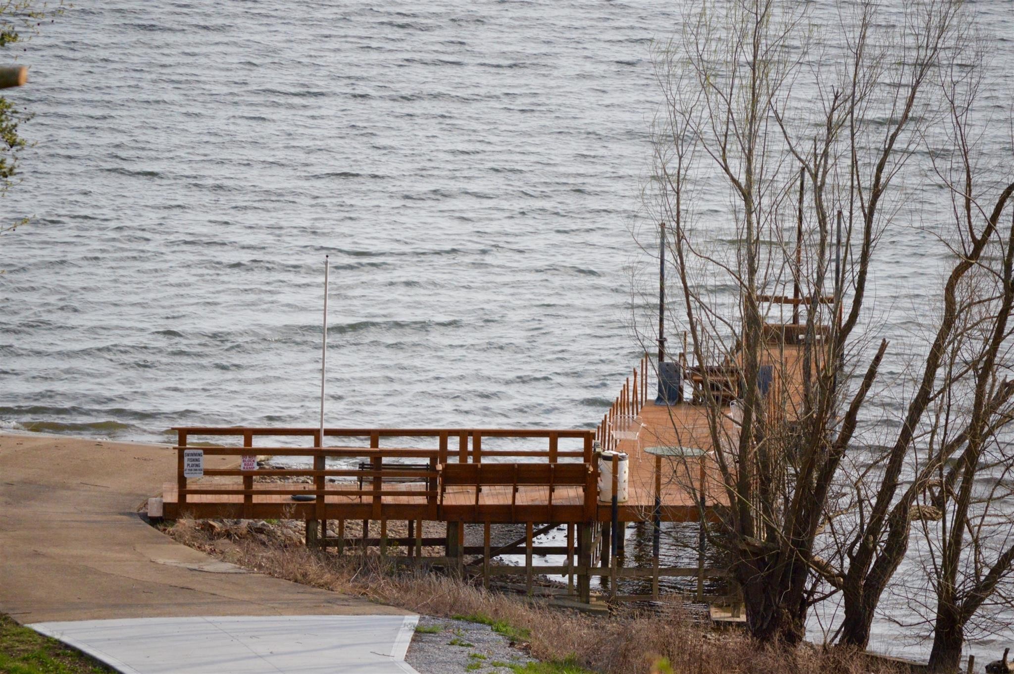 0 Turtle Point Lane Waverly, TN 37185 - Photo 7 of 17 a view of a brick wall with a bench in front of it