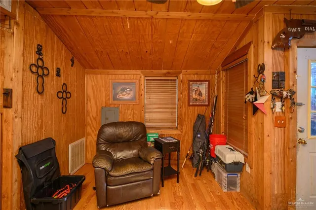 a room with furniture and gym equipment