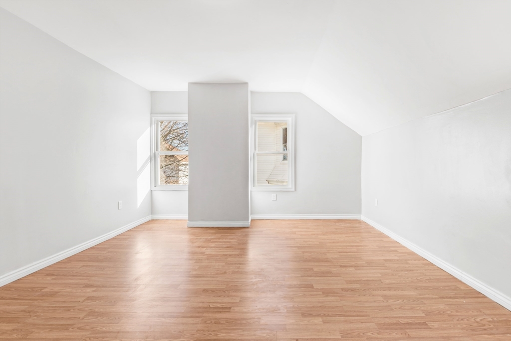 502 4th Street Fall River, MA 02721 - Photo 14 of 34 a view of an empty room with wooden floor