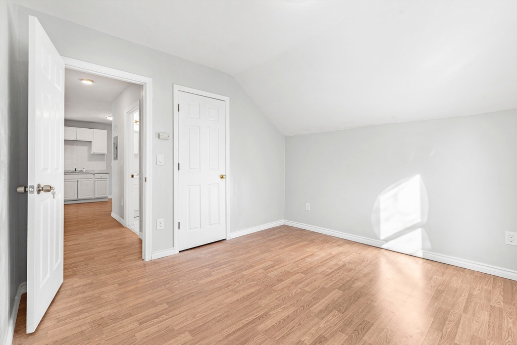 502 4th Street Fall River, MA 02721 - Photo 31 of 34 wooden floor in an empty room