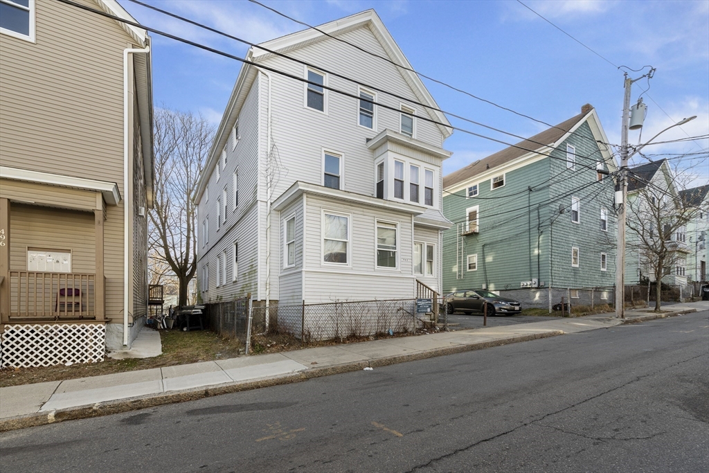 502 4th Street Fall River, MA 02721 - Photo 4 of 34 a front view of a building with a road