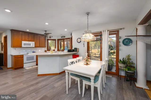 a view of a kitchen and utility room