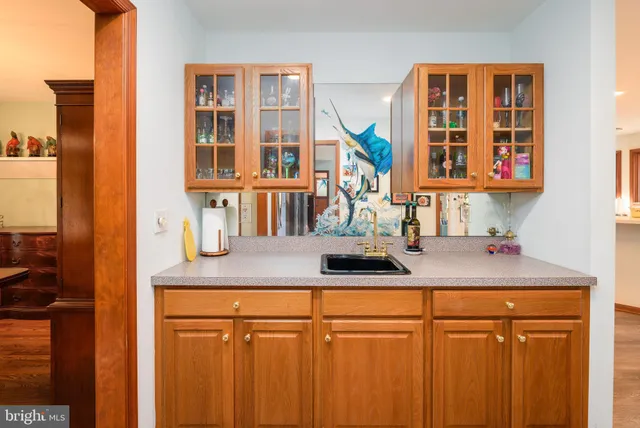 a view of a livingroom with furniture window and wooden floor