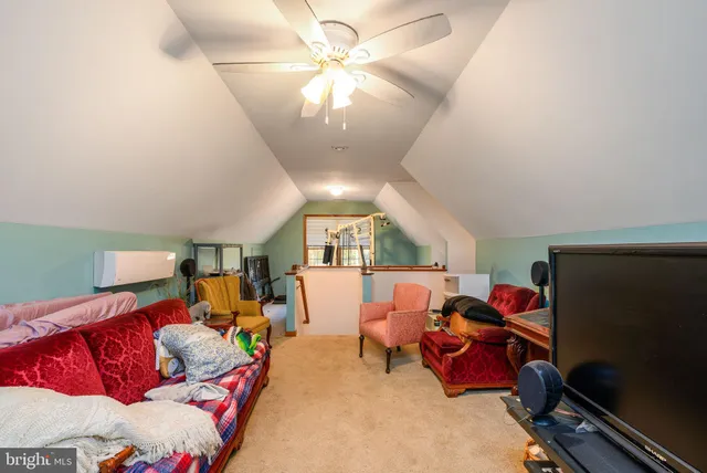 a room with furniture and a window