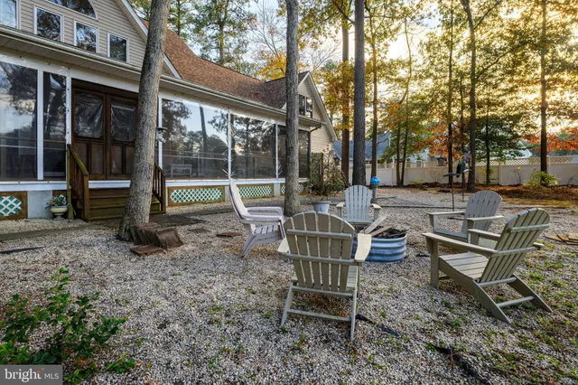 a view of a lake with trees