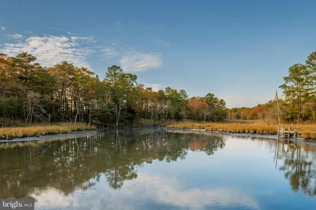 a view of a patio with a table chairs and a patio