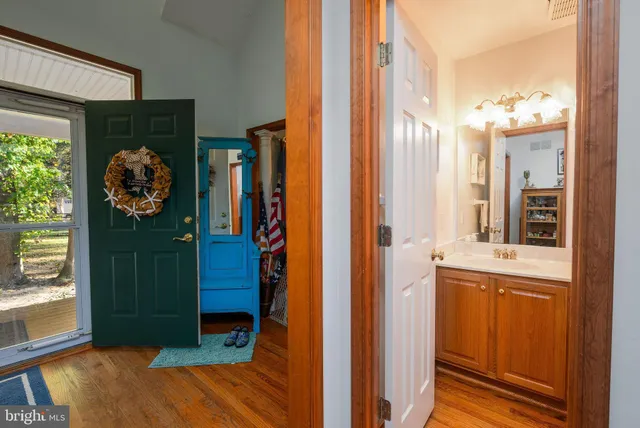 a living room with furniture fireplace and flat screen tv