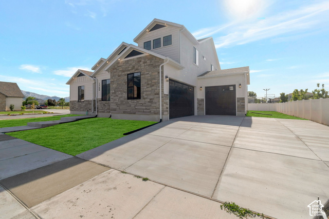 1167 North 600 West, Unit HFE 03 Mapleton, UT 84664 - Photo 5 of 8 Contemporary exterior featuring light-toned siding and stone accents