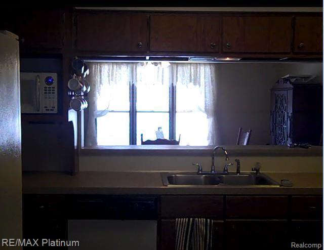 5588 North Latson Road Howell, MI 48855 - Photo 12 of 28 Latson from Kitchen.jpg