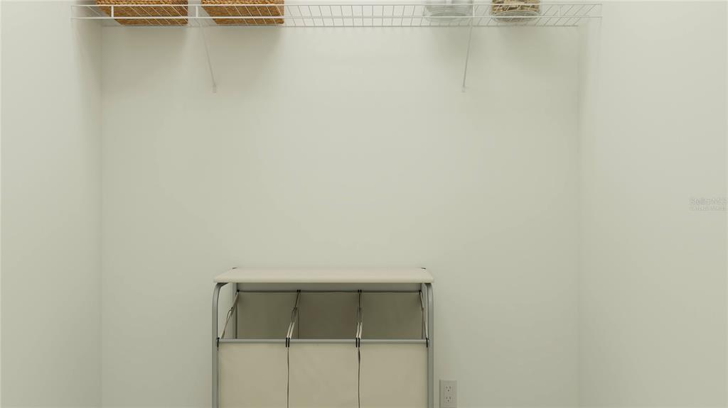 4249 Curacao Place Kissimmee, FL 34758 - Photo 12 of 30 a view of small space with racks on the wall