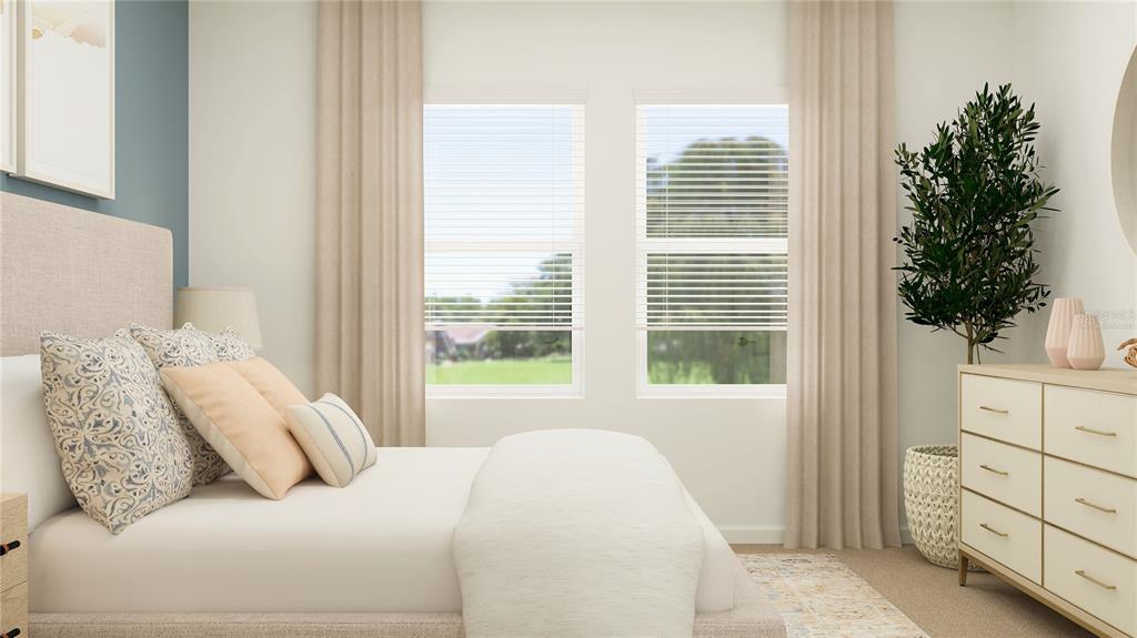 4249 Curacao Place Kissimmee, FL 34758 - Photo 14 of 30 a bedroom with a bed and a window