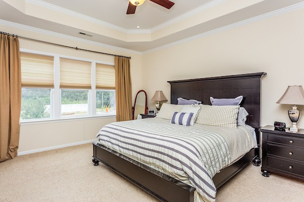 1144 Chapanoke Road Raleigh, NC 27603 - Photo 12 of 22 Master bedroom has lots of windows, trey ceiling and a great walk in closet with a built-in safe Master Bedroom