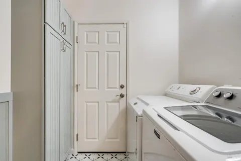 a bedroom with a bed and a book shelf