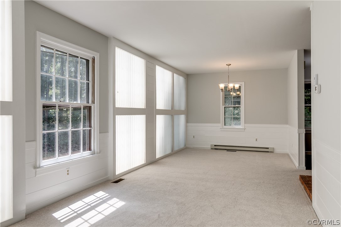 7210 Ledo Road Moseley, VA 23120 - Photo 4 of 27 an empty room with windows