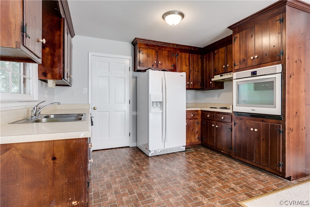 7210 Ledo Road Moseley, VA 23120 - Photo 7 of 27 a kitchen with stainless steel appliances granite countertop a refrigerator and a sink