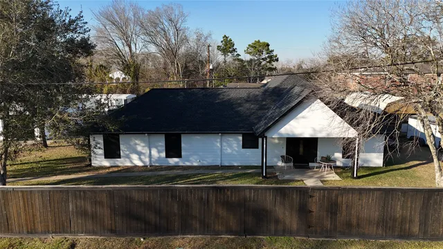 a view of house with yard