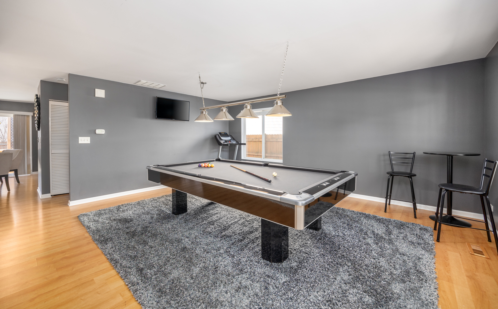 754 Beethoven Street Volo, IL 60073 - Photo 11 of 32 a living room with furniture pool table and a table