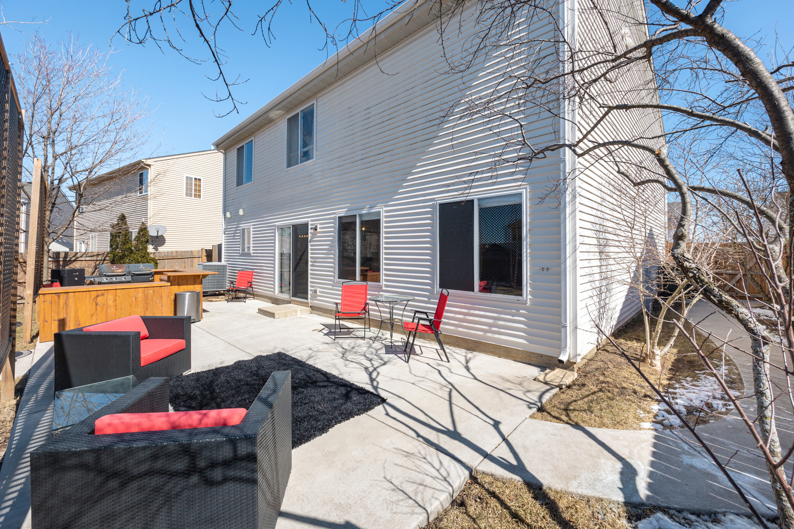 754 Beethoven Street Volo, IL 60073 - Photo 12 of 32 a swimming pool with outdoor seating