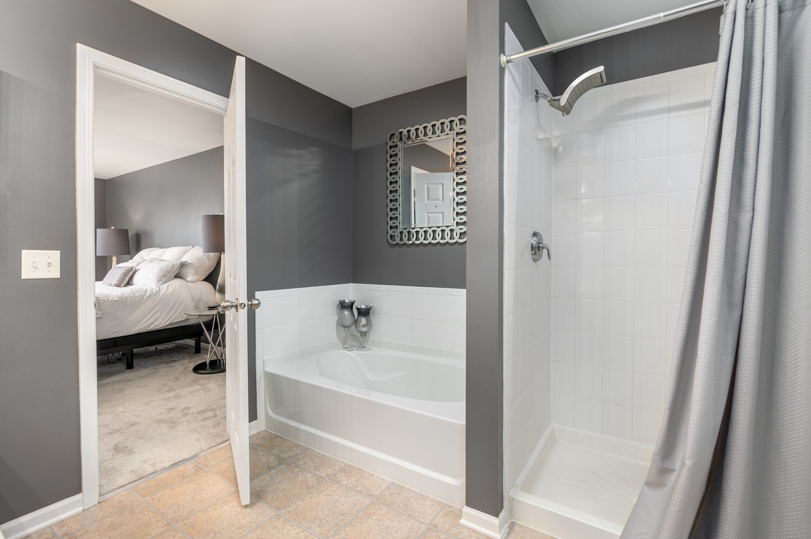 754 Beethoven Street Volo, IL 60073 - Photo 20 of 32 a bathroom with a tub and shower