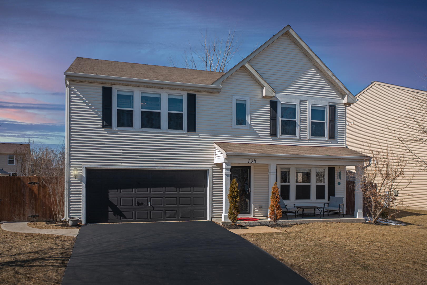 754 Beethoven Street Volo, IL 60073 - Photo 23 of 32 a front view of a house with a yard