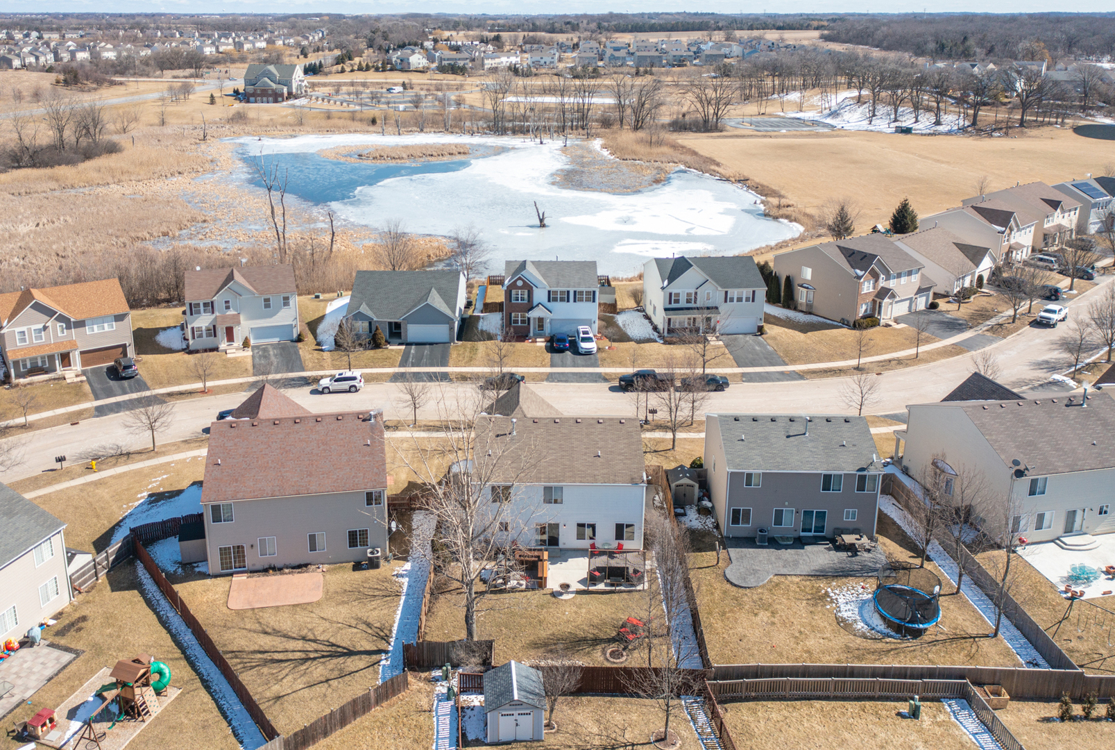 754 Beethoven Street Volo, IL 60073 - Photo 32 of 32 an aerial view of residential houses with outdoor space