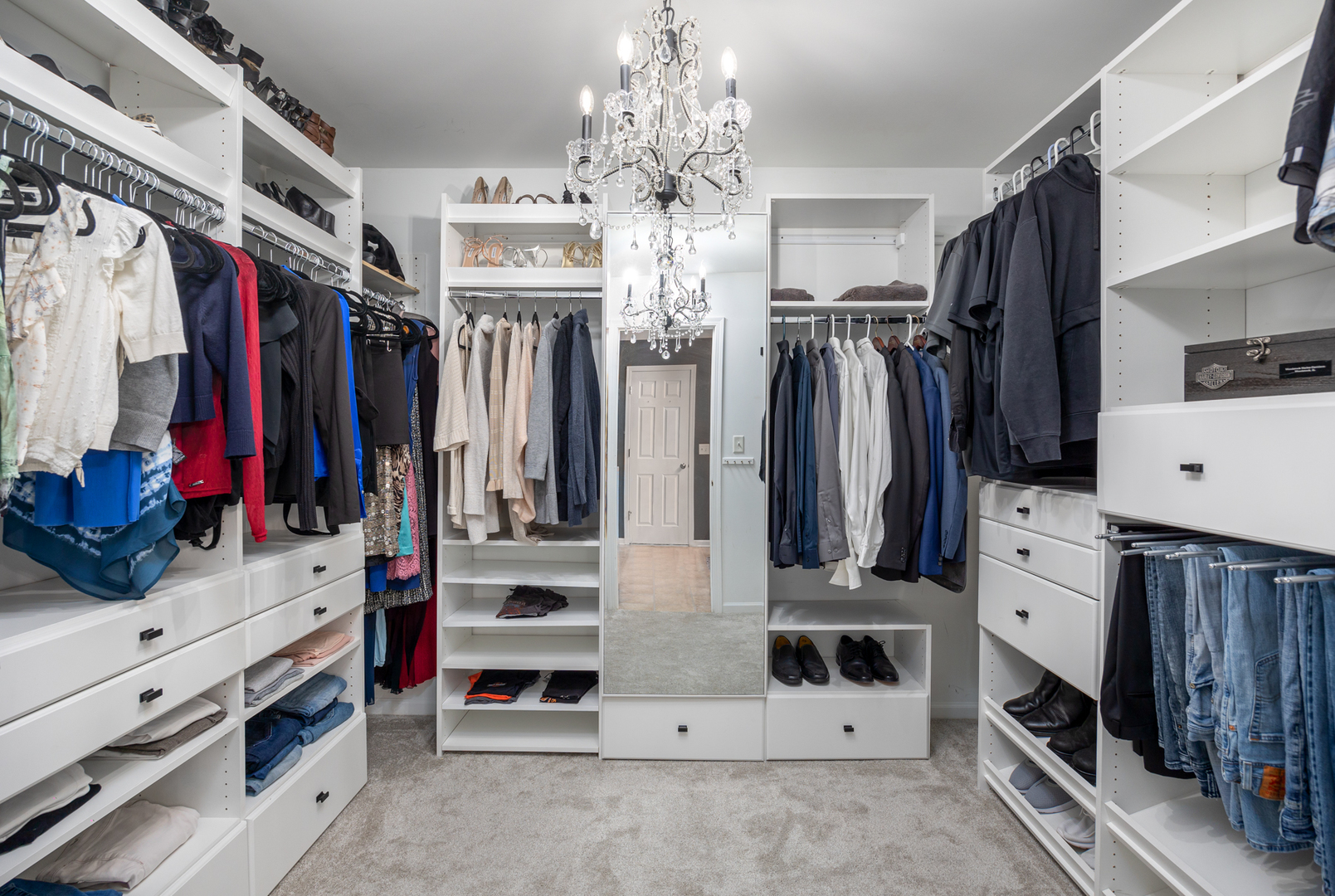 754 Beethoven Street Volo, IL 60073 - Photo 8 of 32 a view of walk in closet with clothes and shoes
