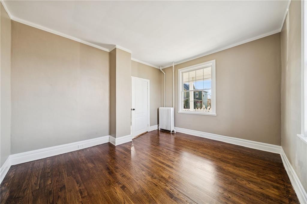 1908 Walnut Drive Latrobe, PA 15650 - Photo 13 of 34 a view of an empty room with wooden floor and a window