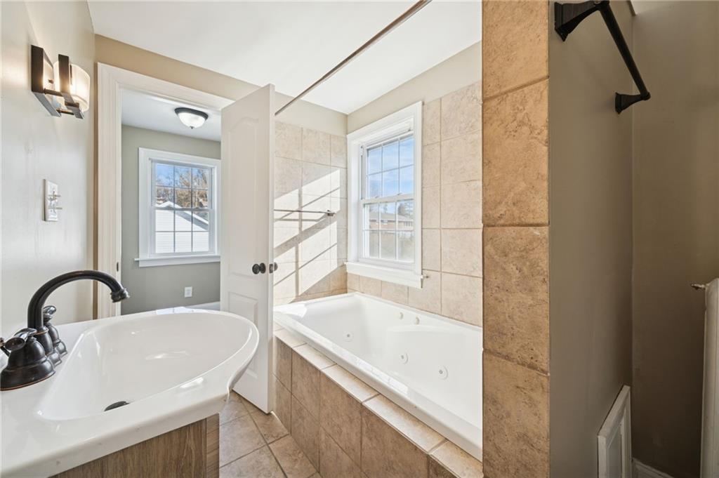 1908 Walnut Drive Latrobe, PA 15650 - Photo 22 of 34 a bathroom with a sink and a bathtub