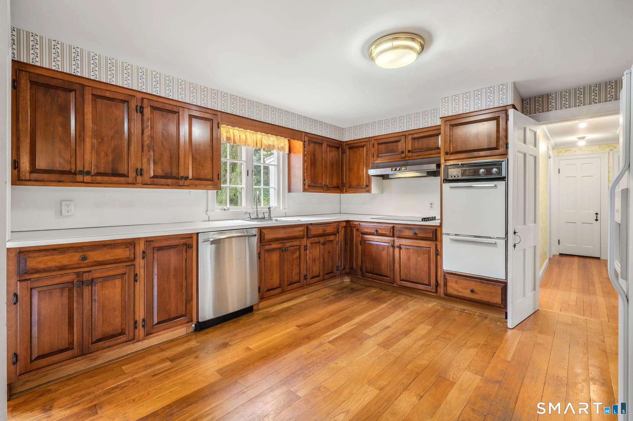 33 Coit Lane Norwich, CT 06360 - Photo 12 of 40 The possibilities are endless in this large, bright kitchen with plenty of cabinet space