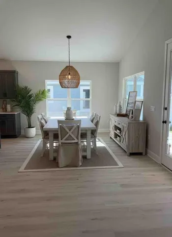 a living room with furniture and a table