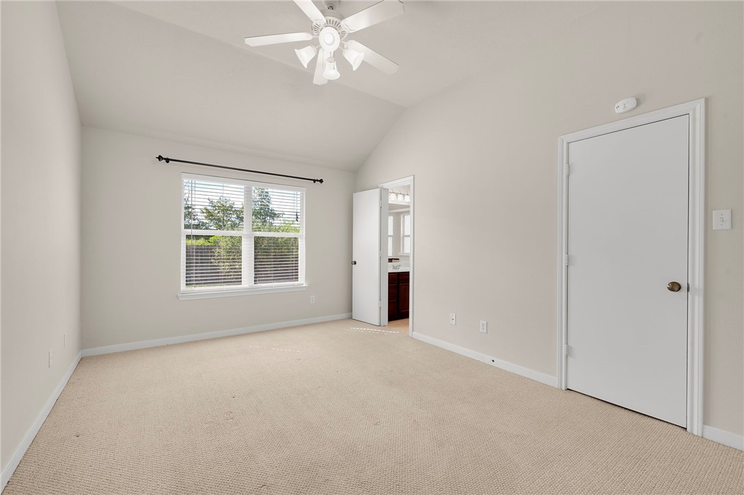 919 Windmeadows Drive College Station, TX 77845 - Photo 7 of 12 a view of an empty room with a window