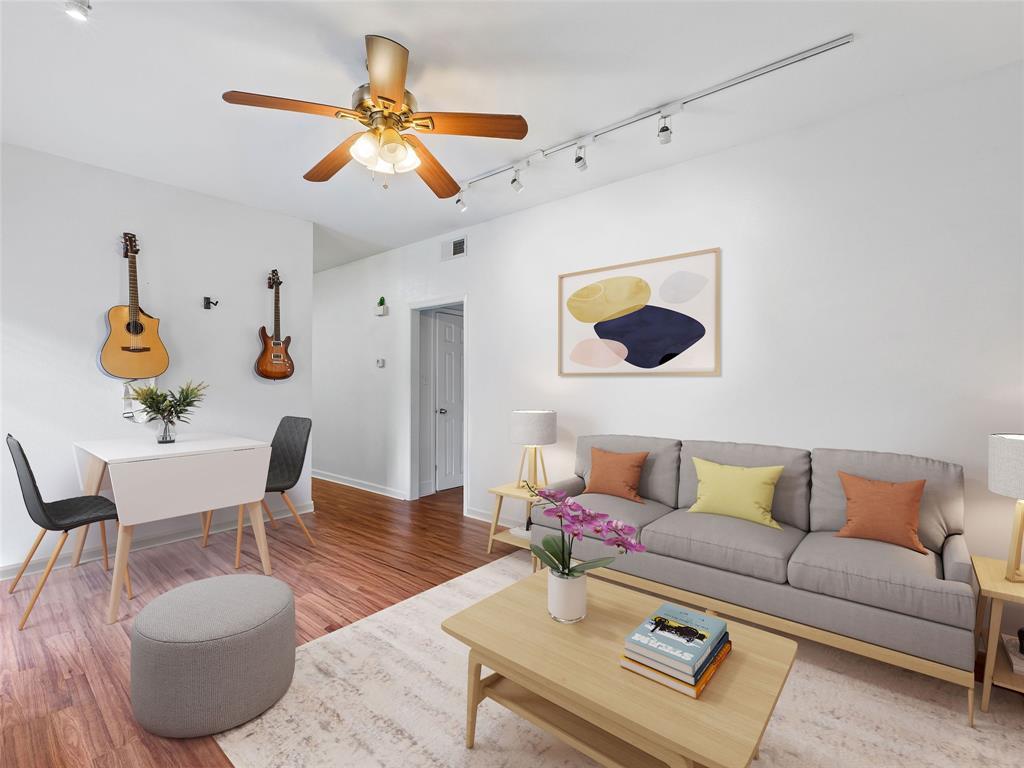 2801 Rio Grande Street, Unit 205 Austin, TX 78705 - Photo 7 of 25 a living room with furniture