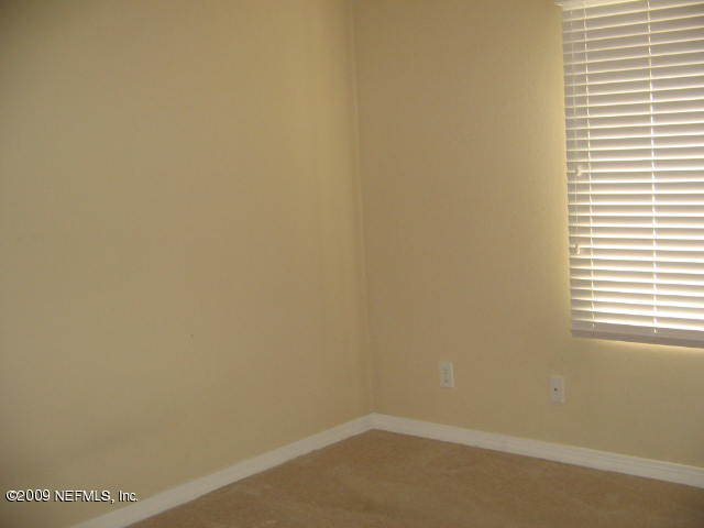 355 Monument Road, Unit 22E2 Jacksonville, FL 32225 - Photo 10 of 12 master bedroom