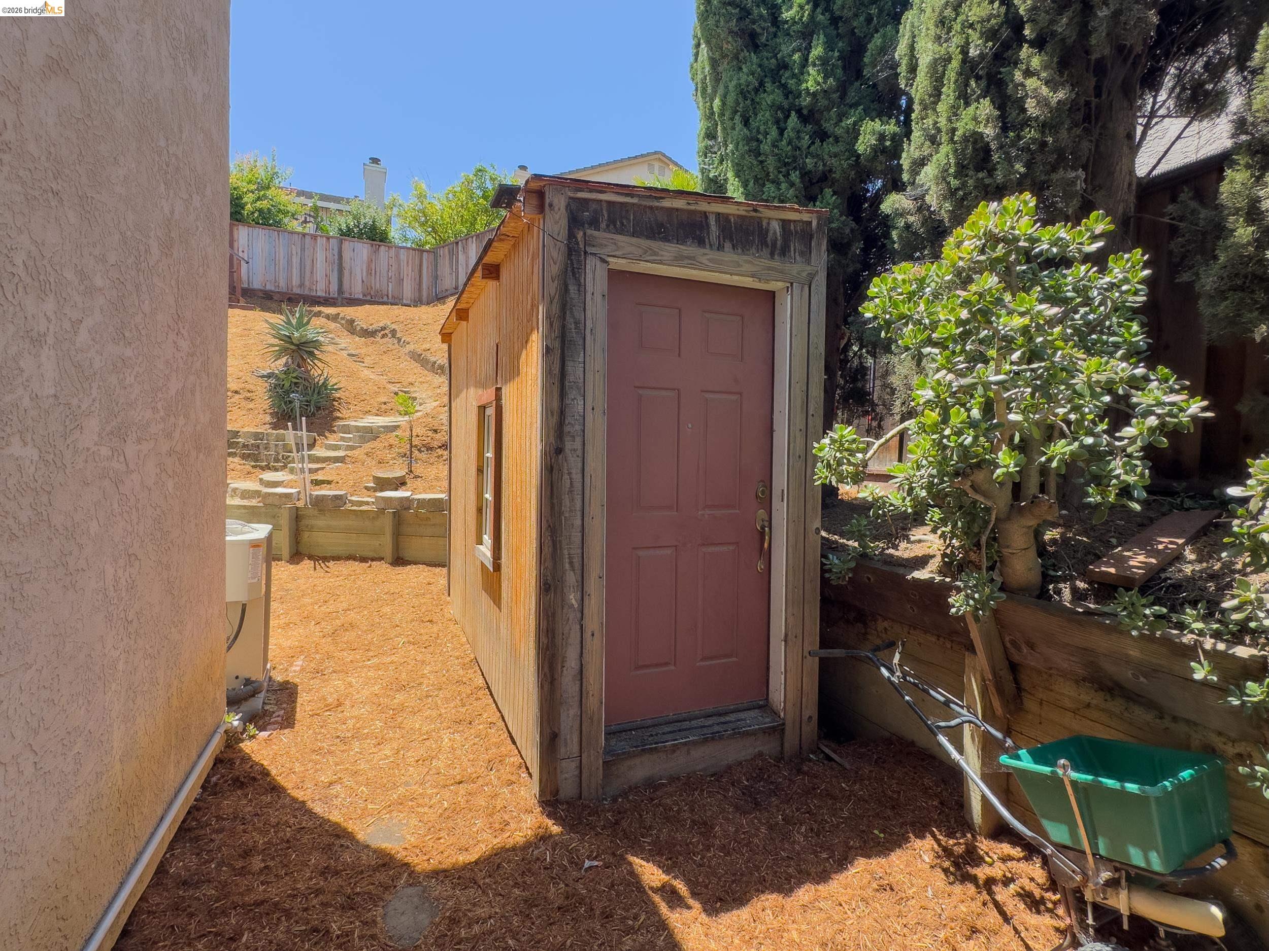 512 Burdick Drive Bay Point, CA 94565 - Photo 48 of 50 Freestanding wooden shed featuring a panel door and single window
