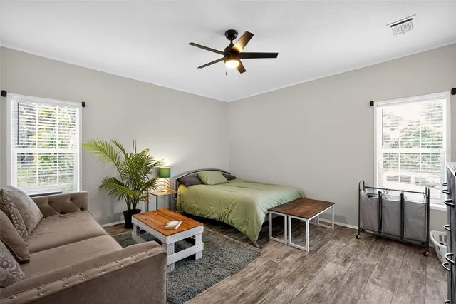 a living room with furniture and a window