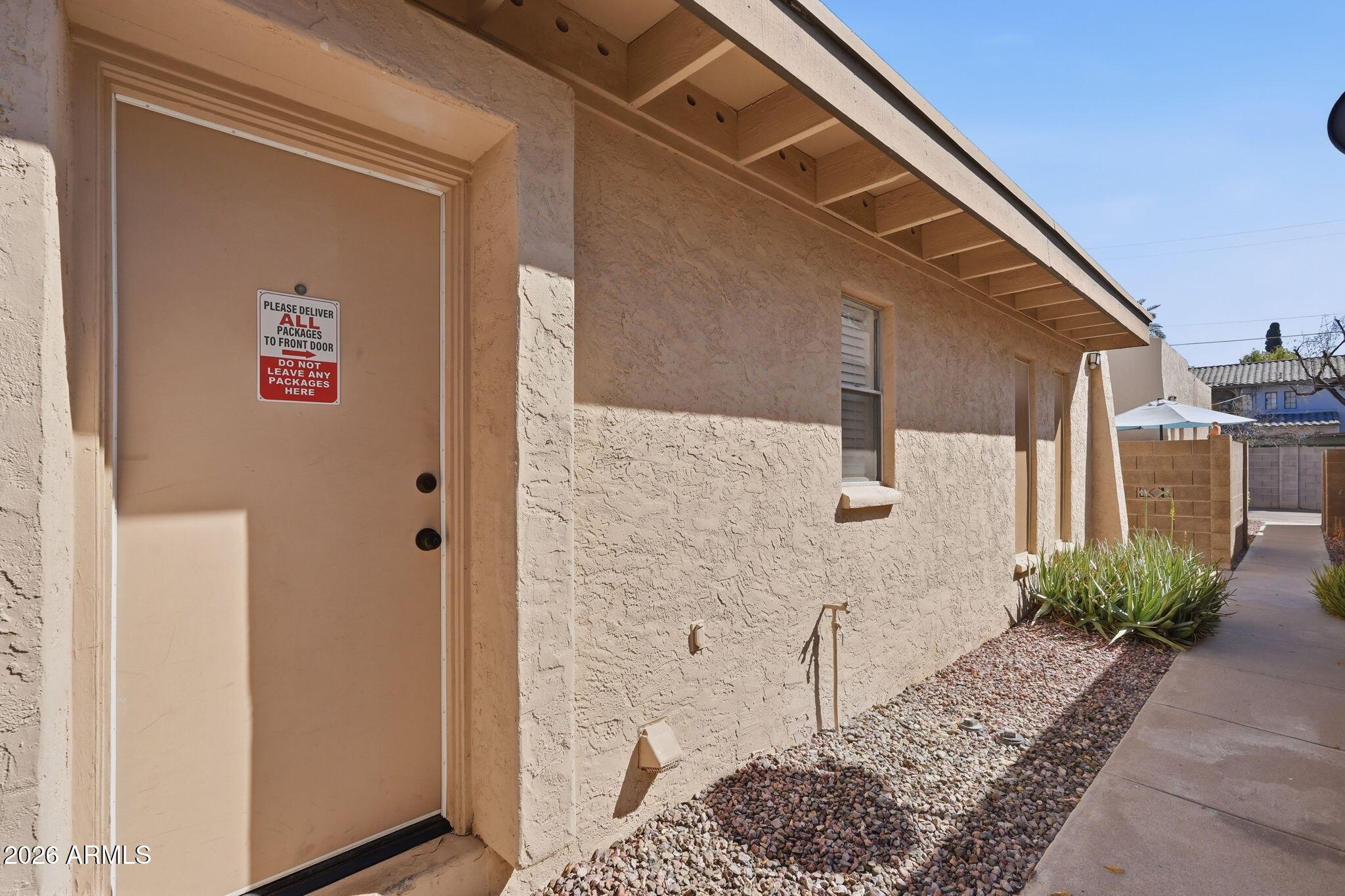 231 North Robson, Unit 7 Mesa, AZ 85201 - Photo 27 of 29 a bathroom with a shower