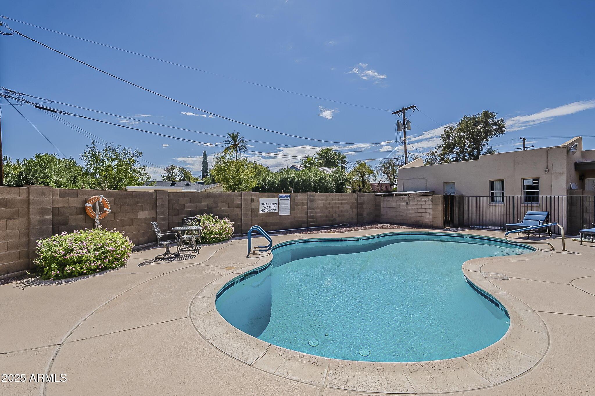 231 North Robson, Unit 7 Mesa, AZ 85201 - Photo 5 of 29 a view of a backyard with sitting area