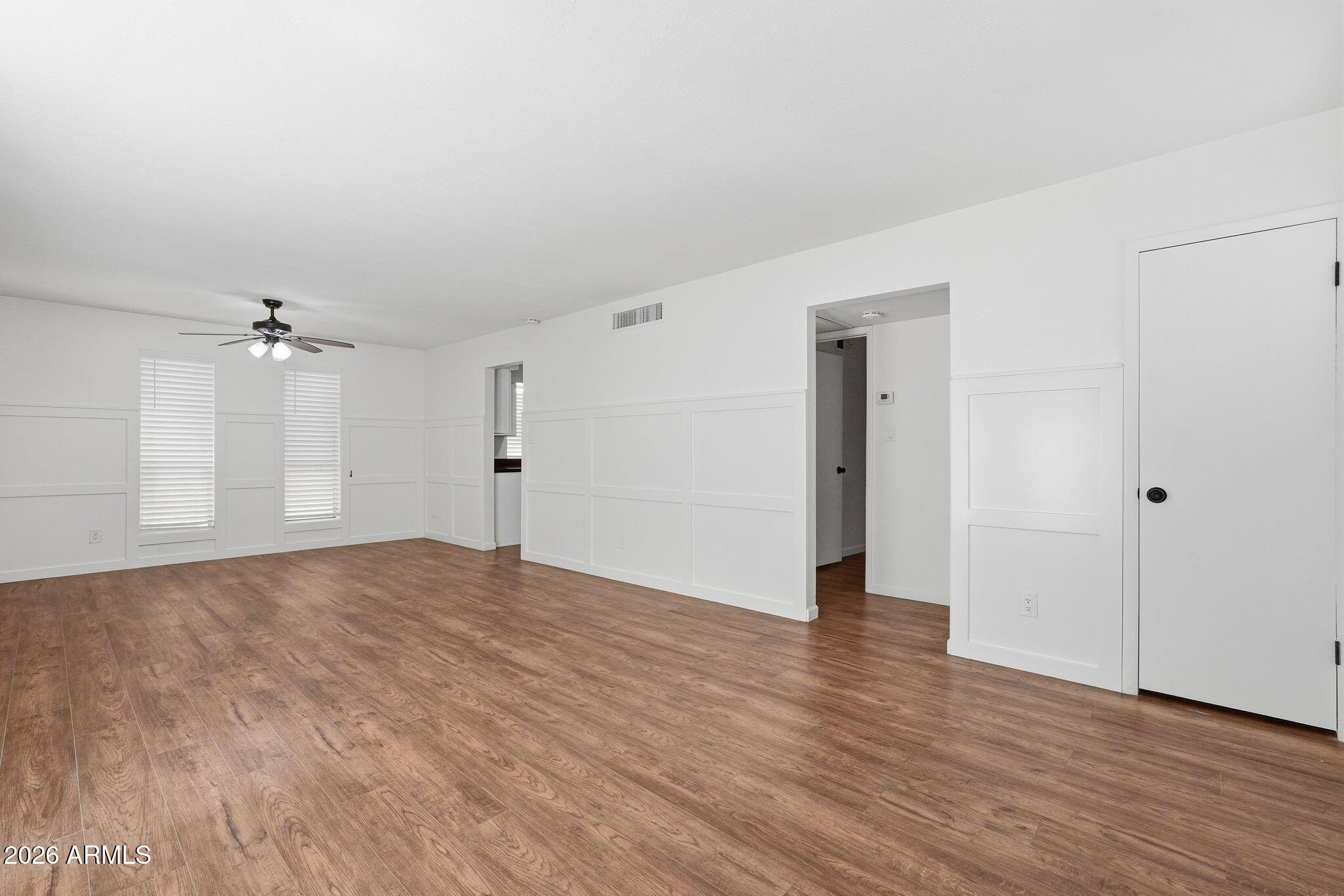 231 North Robson, Unit 7 Mesa, AZ 85201 - Photo 6 of 29 a view of empty room with wooden floor