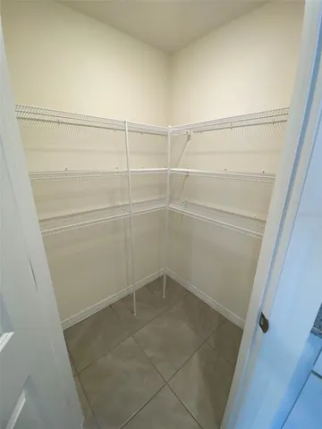 a kitchen with stainless steel appliances granite countertop a sink stove and microwave