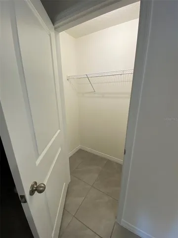 a bathroom with a shower and toilet