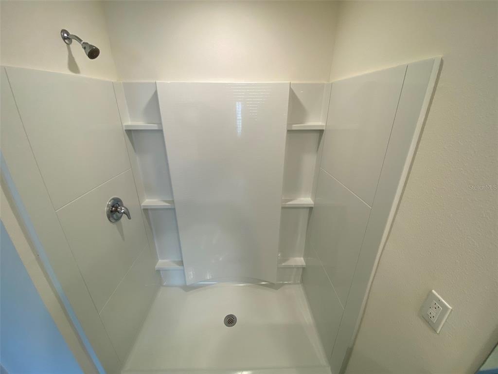 4961 Southwest 88th Place Ocala, FL 34476 - Photo 32 of 50 a bathroom with a shower
